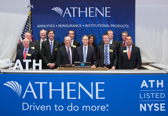 Athene Holding executive team posing at the New York Stock Exchange on listing day of Athene's IPO