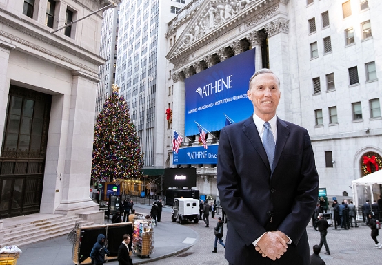 Jim Belardi posing outside of the New York Stock Exchange building